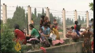 Uzbeks flee Kyrgyzstan violence [upl. by Airdnas637]